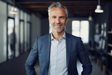 Premium Ai Image Portrait Of A Smiling Mature Businessman Generative