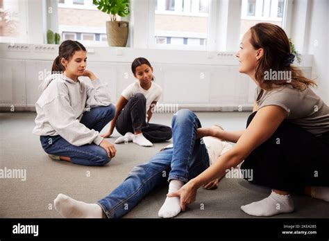 Teacher Giving First Aid Training Stock Photo Alamy
