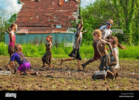 Kids Playing Mud Fight Stock Photo Royalty Free Image 85524827 Alamy