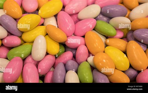 Pile Of Colorful Sugar Coated Egg Shaped Candies With Chocolate