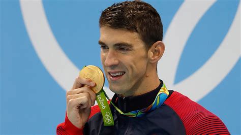 Michael Phelps wins gold in 200 fly, adds to record medal tally | wbir.com