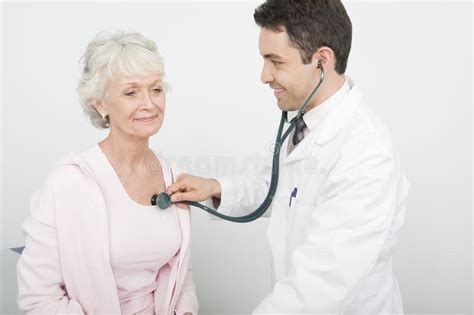 Doctor Checking Patient S Heartbeat Using Stethoscope Stock Image