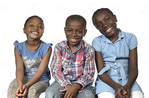 Three African Kids Holding On Another Smiling Stock Photo Image Of