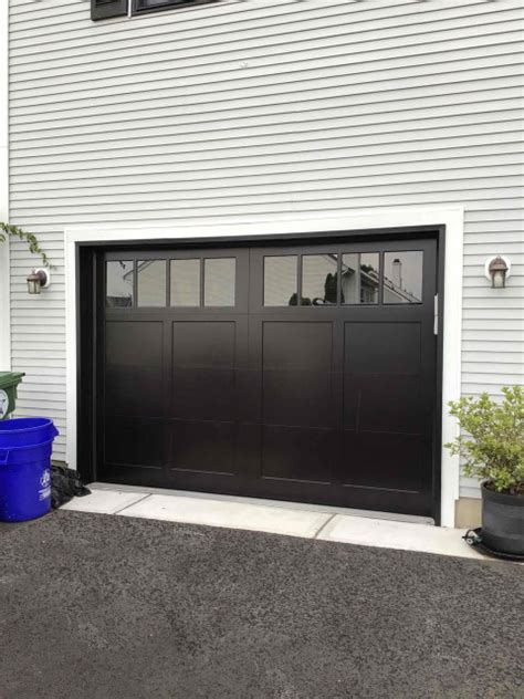 Black Modern Carriage House Garage Door - Modern - Garage - New York ...