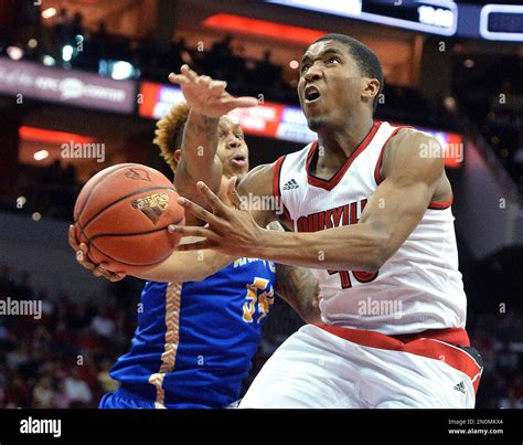 Louisville S Donovan Mitchell Right Goes To The Basket Past UMKC S