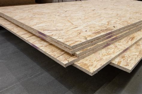 L Minas De Madera Prensada Osb Apiladas En Materiales De Construcci N