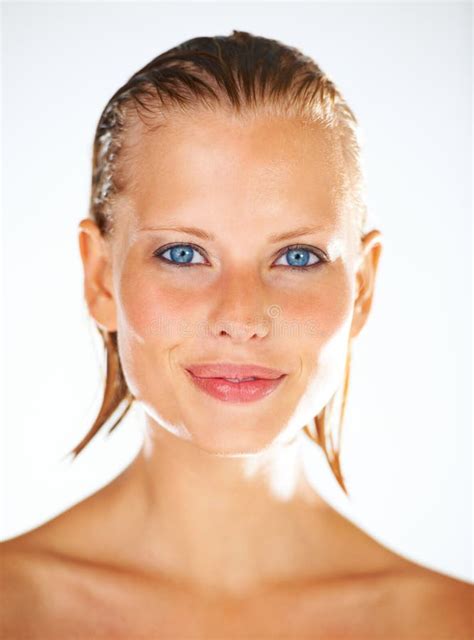 Soft And Beautiful Closeup Portrait Of A Pretty Young Woman Smirking