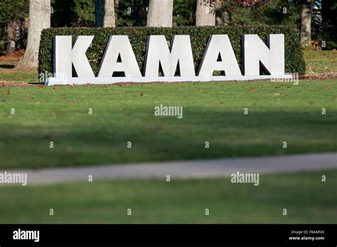 A Logo Sign Outside Of The Headquarters Of Kaman Aerospace Corporation