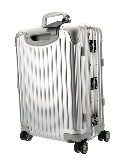 Rimowa Metal Rolling Suitcase Metallic Luggage And Travel Handbags