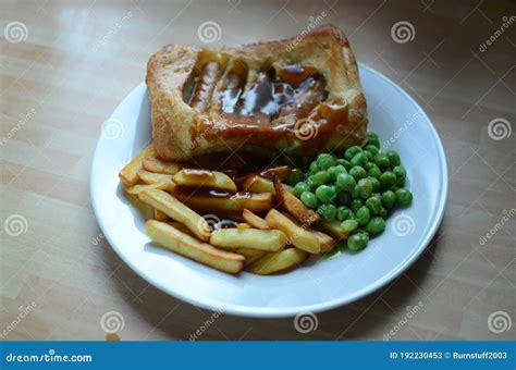 Toad in the Hole or Sausage Toad is a Traditional English Dish Stock ...