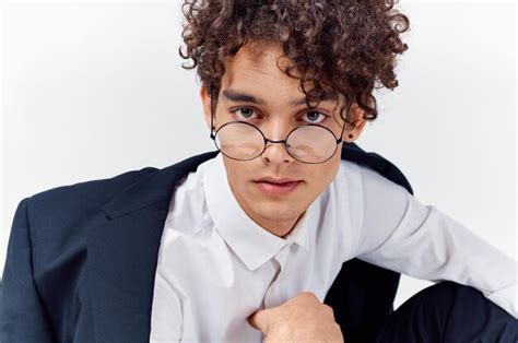 Premium Photo Closeup Portrait Of Handsome Guy With Curly Hair