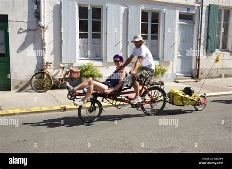 Cyclists using the Ile de Re cyclepaths Stock Photo - Alamy