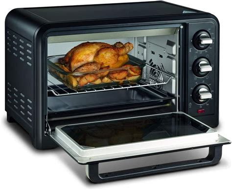 An Open Toaster Oven With Chicken In It