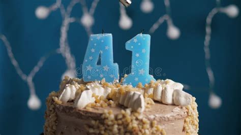 Birthday Cake with 41 Number Candle on Blue Backgraund. Candles are Set on Fire Stock Photo ...