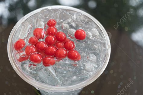 Closeup Strawberry Italian Soda With Ice And Jelly Ball Photo