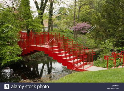 Red Metal Bridge In Dow Gardens Stock Photo Alamy