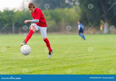 Boy Kicking Soccer Ball Stock Image Image Of Kids Playing 85330169