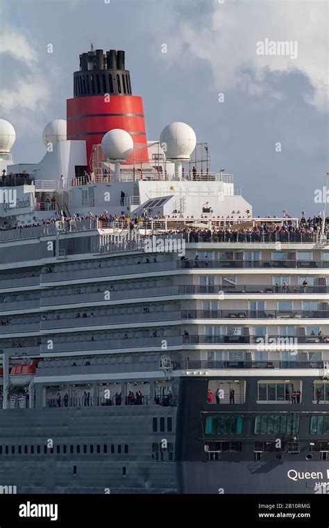 Stern Of The Queen Elizabeth Cruise Ship Showing Passengers Waving As