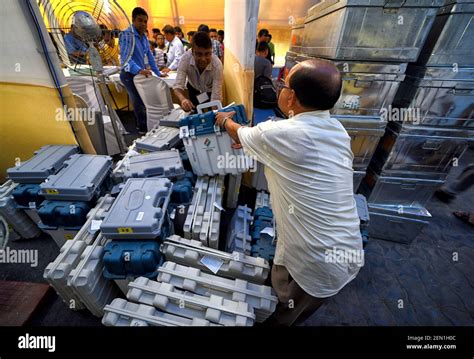 An Electoral Staff Member Seen Arranging The Electronic Voting Machines