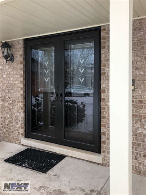 Protect Your New Entry Doors From This Winter Weather By Adding Matching Storm Doors Shown Here