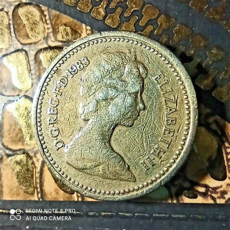 RARE 1983 ROYAL ARMS ONE POUND COIN ERROR DECUS ET TUTAMEN UPSIDE