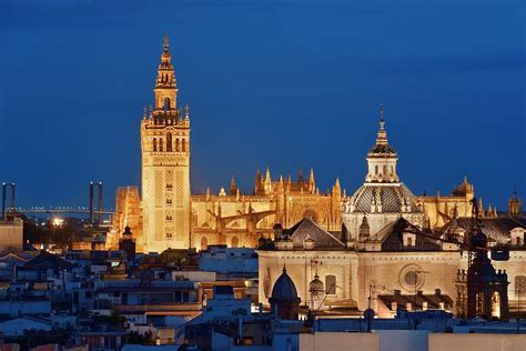 Seville night rooftop view Photograph by Songquan Deng - Fine Art America