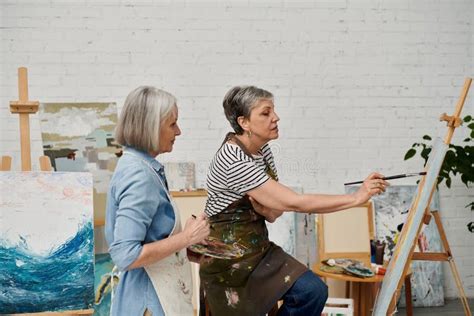 Two Mature Women In An Art Stock Image Image Of Easel