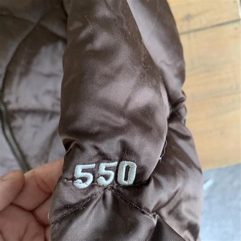 -brown north face puffer jacket -size xs -slight... - Depop