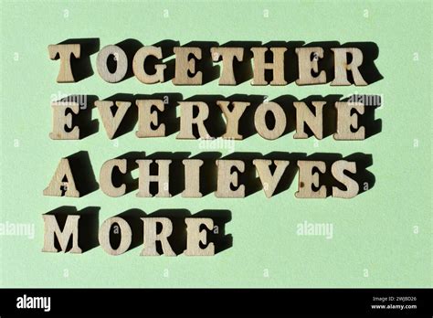 Team Acronym For Together Everyone Achieves More In Wooden Alphabet