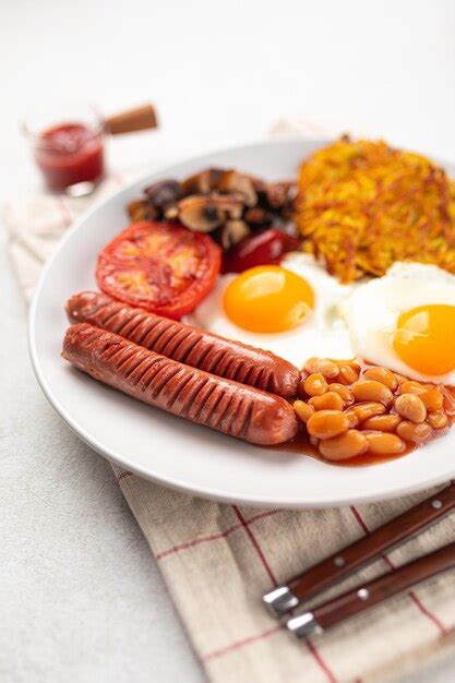 Premium Photo | English breakfast with eggs and sausages