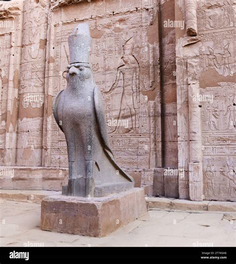 Granite Statue Of God Horus Falcon At Entrance Temple Of Horus Edfu