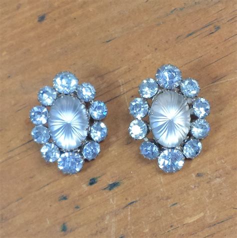 Reserved For Laura Sparkly Light Blue Clip On Earrings Etsy Etsy Earrings Rhinestone