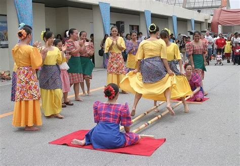 Tinikling: The National Dance Of The Philippines With Bamboo Poles ...