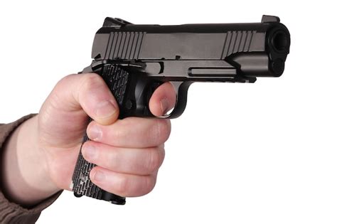 Pistola En Mano Foto Premium