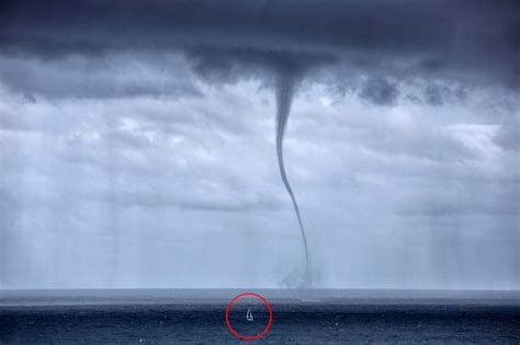 Incredible Photos Show Terrifying Moment 1 000ft Waterspout Forces