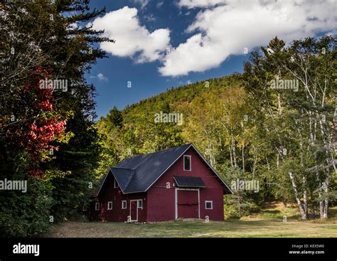 New Hampshire Farm House Nestled In The Trees Stock Photo Alamy