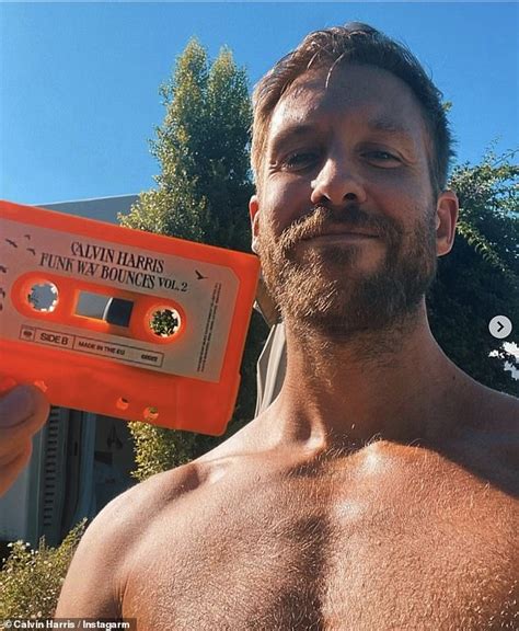 Shirtless Calvin Harris Shows Off His Toned And Tanned Physique While