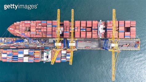 Aerial Top View Of Container Ship In A Container Terminal Port