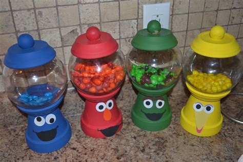 Sesame Street Candy Jars Clay Pot Crafts Clay Pot Projects Candy Jars