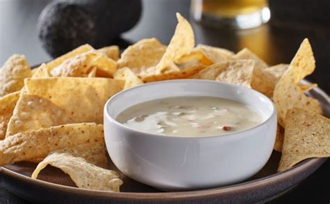 National Queso Day 2024: QDOBA's new queso; snag freebies and deals