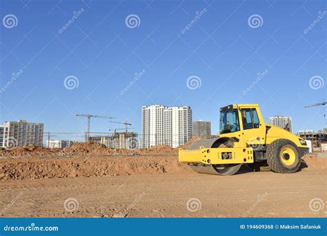 Vibro Roller Soil Compactor Leveling Soil At Construction Site