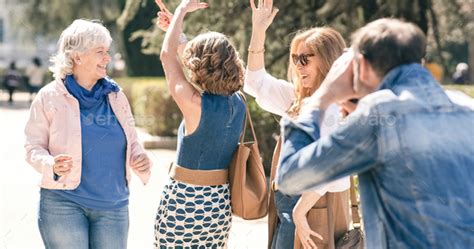 Man Shooting Mature Women Dancing In Park Stock Photo By MegiasD PhotoDune