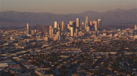 K Stock Footage Aerial Video Tilt From Urban Neighborhood To Reveal