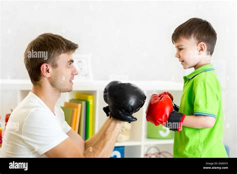 Kid Boy And Father Play Boxing Stock Photo Alamy