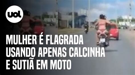 Mulher é flagrada em garupa de moto vestindo apenas lingerie em GO veja YouTube