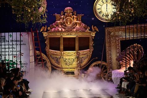 An Elaborately Decorated Carriage Is On Display At A Fashion Show