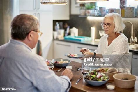 Husband Serving Dinner Photos Et Images De Collection Getty Images