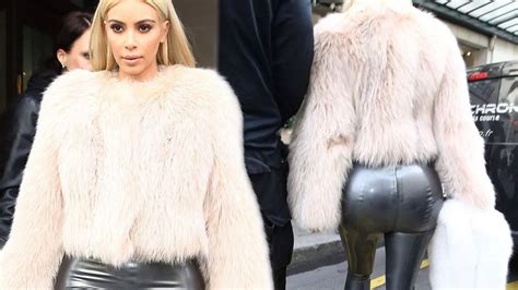 Newly Blonde Kim Kardashian Squeezes Her Famous Bum Into Super Tight