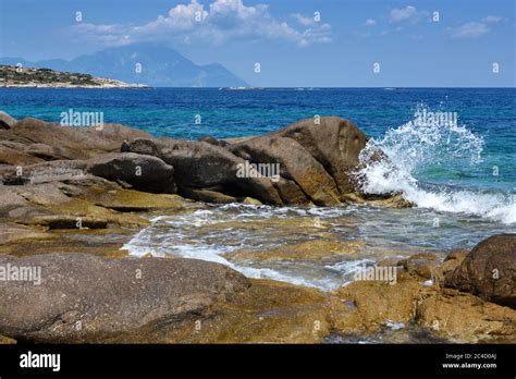 Beautiful Seascape With Stones And Translucent Blue Water Stock Photo