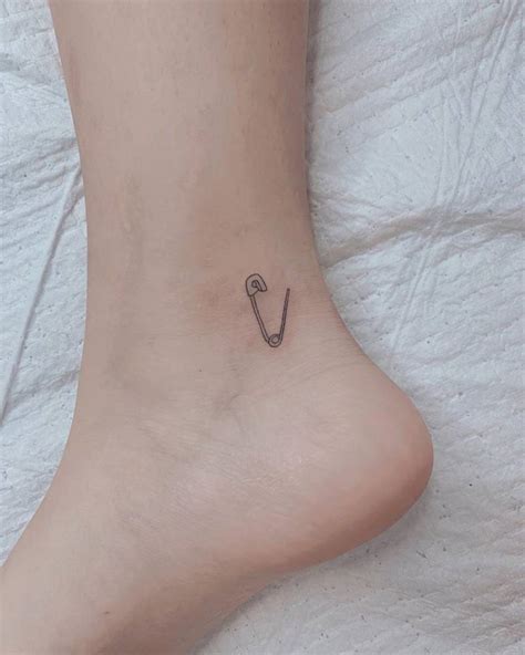 Safety Pin Tattoo On The Ankle